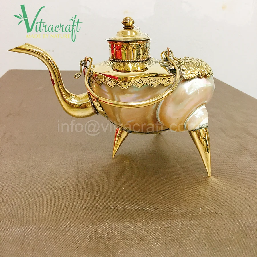 Handmade tea set. Made from Premium nautilus shells, Combined with a copper metal. Create unique products. meaningful gift