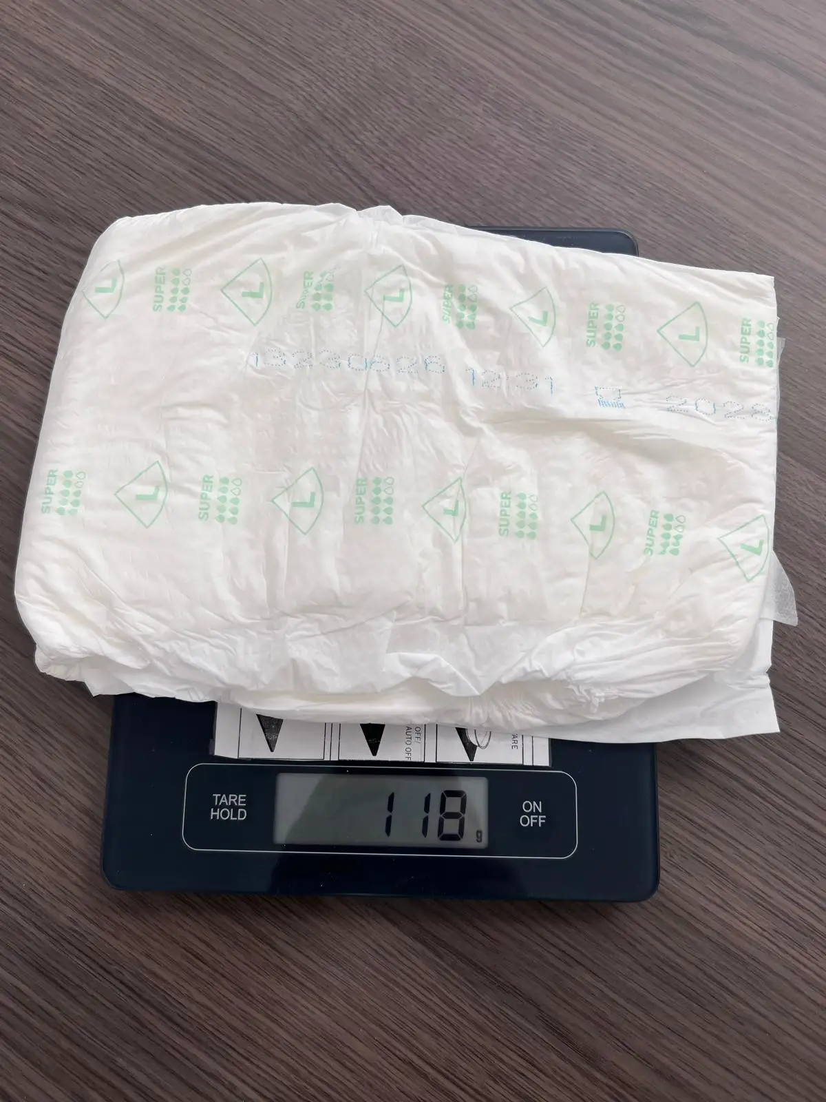 Premium adult diapers in compressed bales (EU)