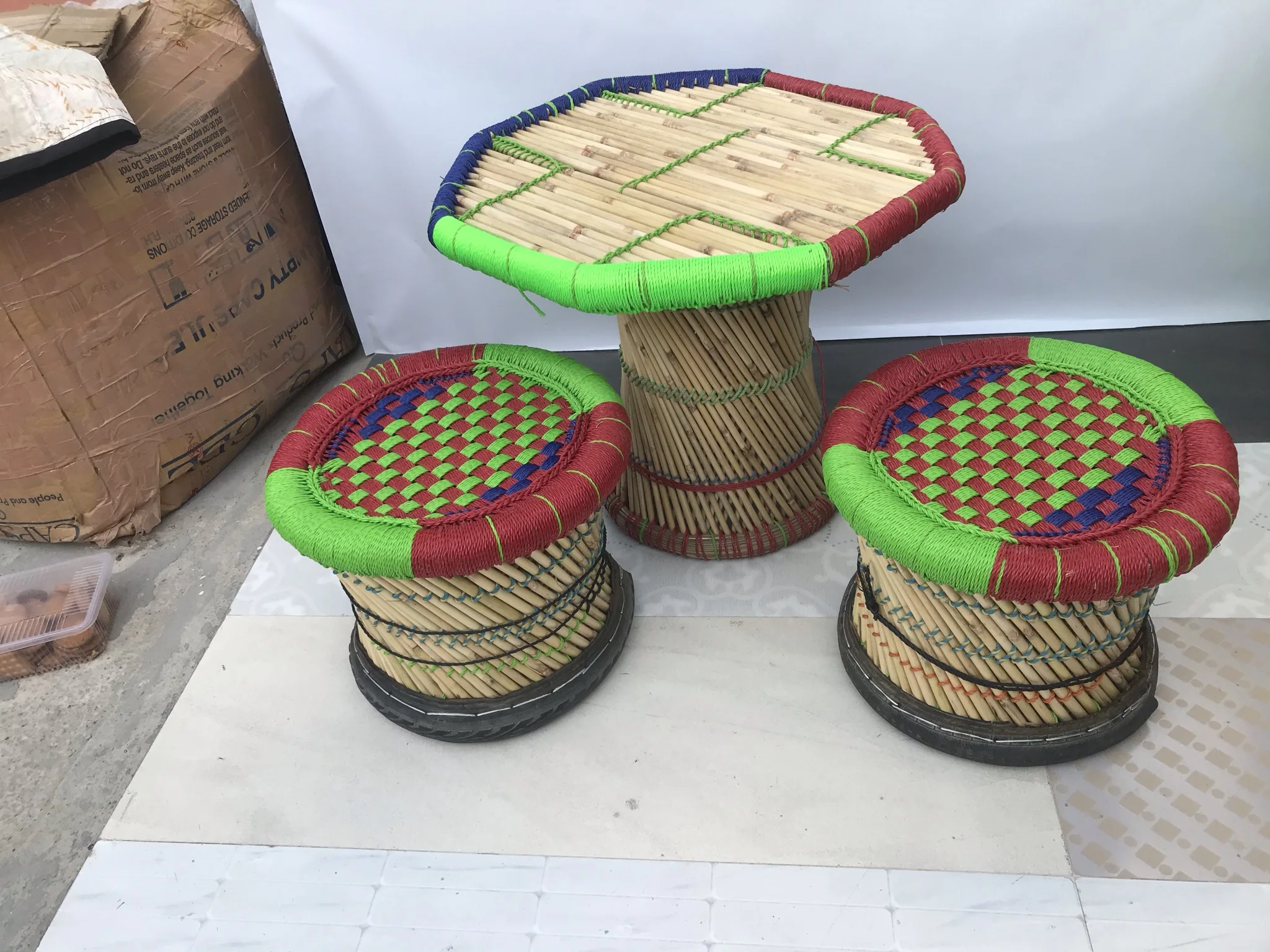Wholesale Eco friendly Bamboo Rattan Indoor Outdoor Garden Lawn Backyard Furniture 4 Ottoman Stools With Table