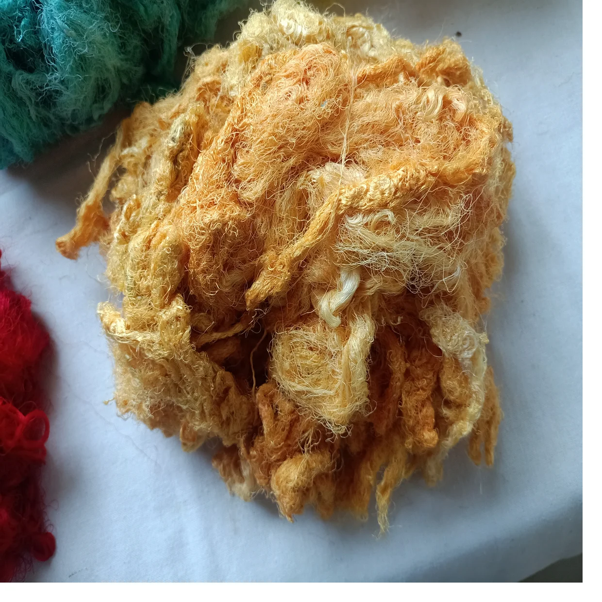 Custom made sari silk waste fiber dyed in custom dyed colors suitable for yarn and fiber stores ideal for resale in blue colour