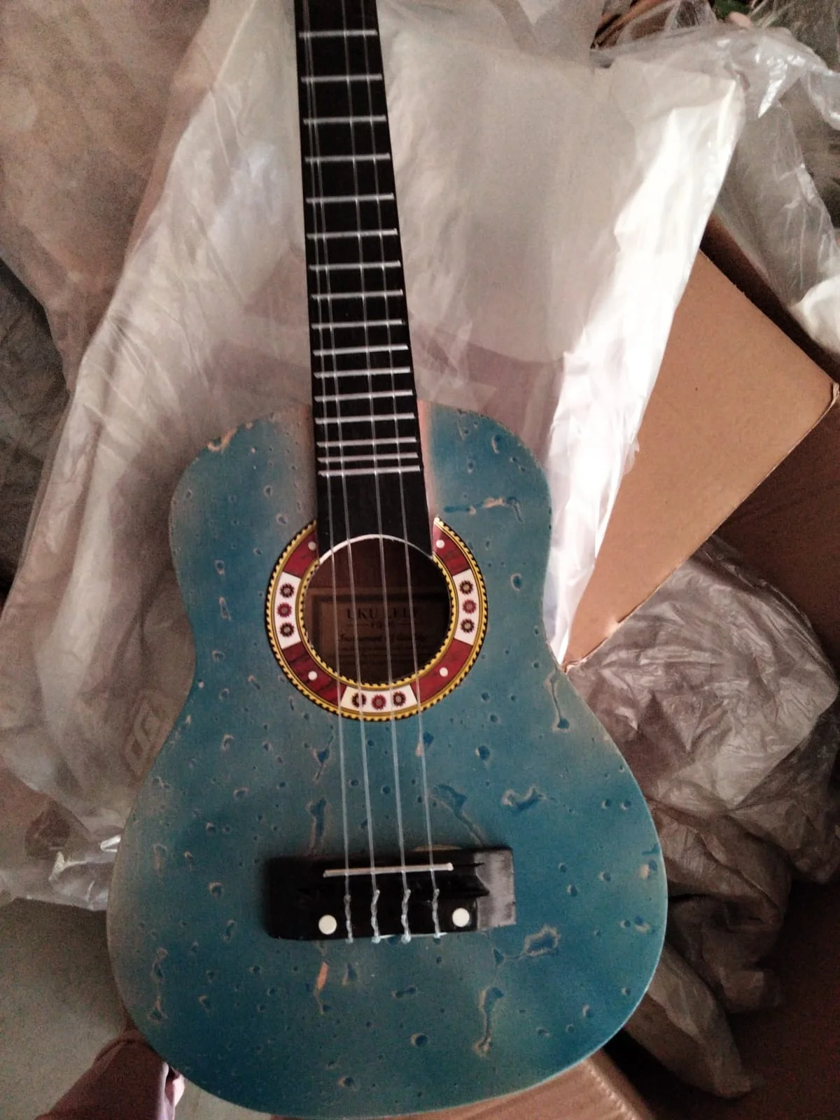 Nice product customized logo and design wholesale available in may colors wooden Bali cheap Ukulele