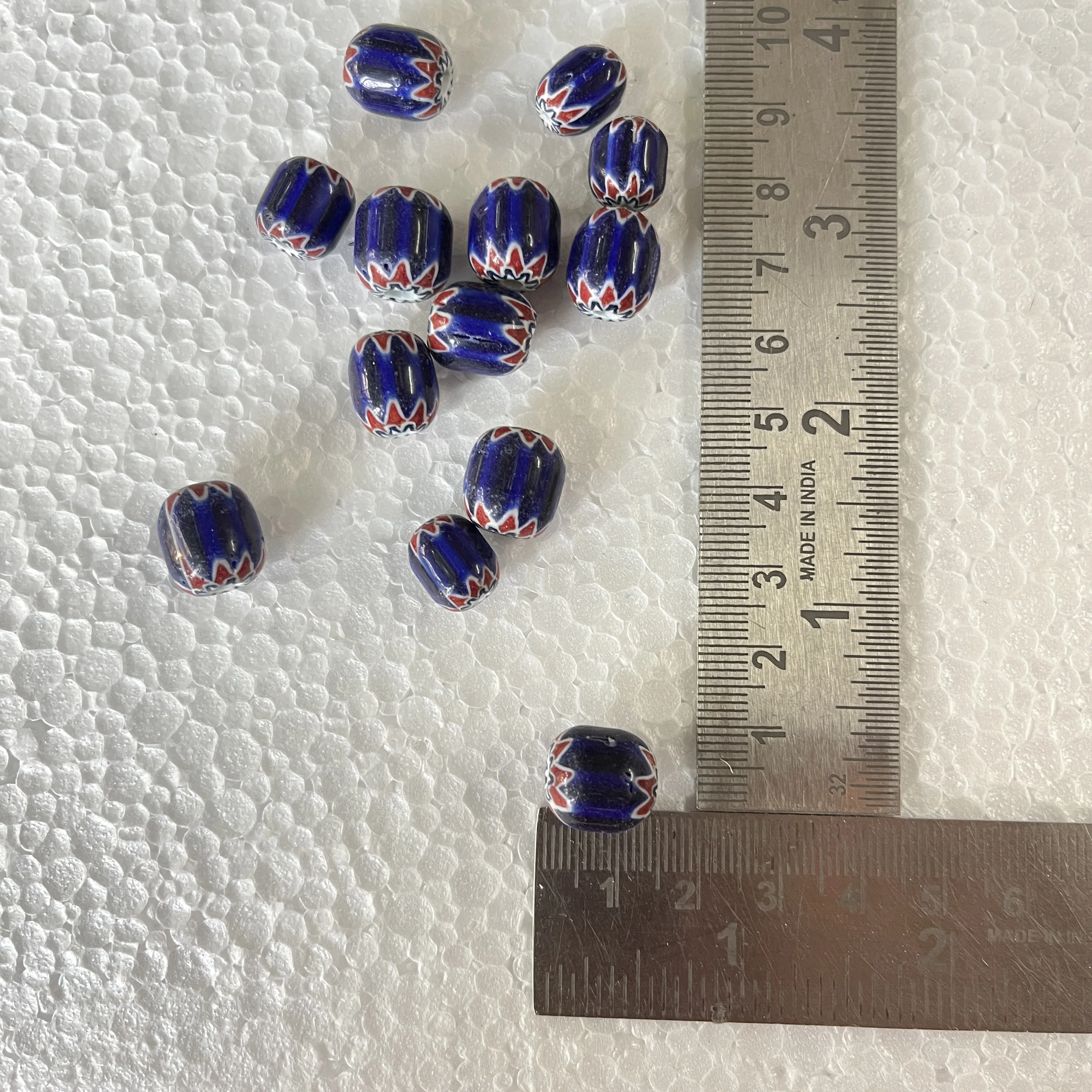 custom made glass striped chevron beads with blue & red coloured stripes idea for resale by bead stores and jewelry designers