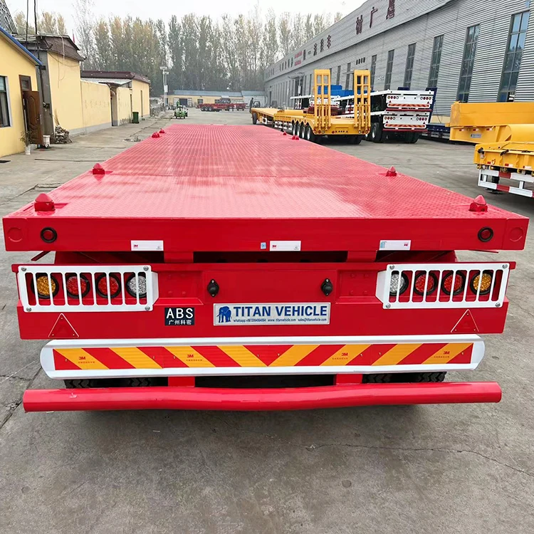 Hot Sale 3/Tri Axle 20 Ft 40 Foot 3 Axle Flatbed Container Semi Truck Trailer for Sale in Tanzania Dar Es Salaam