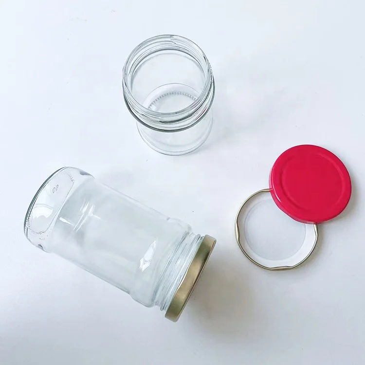 Wholesale 200ml 300ml Round Glass Honey Jar and Golden Metal Lug Guacamole Peanut Butter Glass Jar with Twist Off Lid