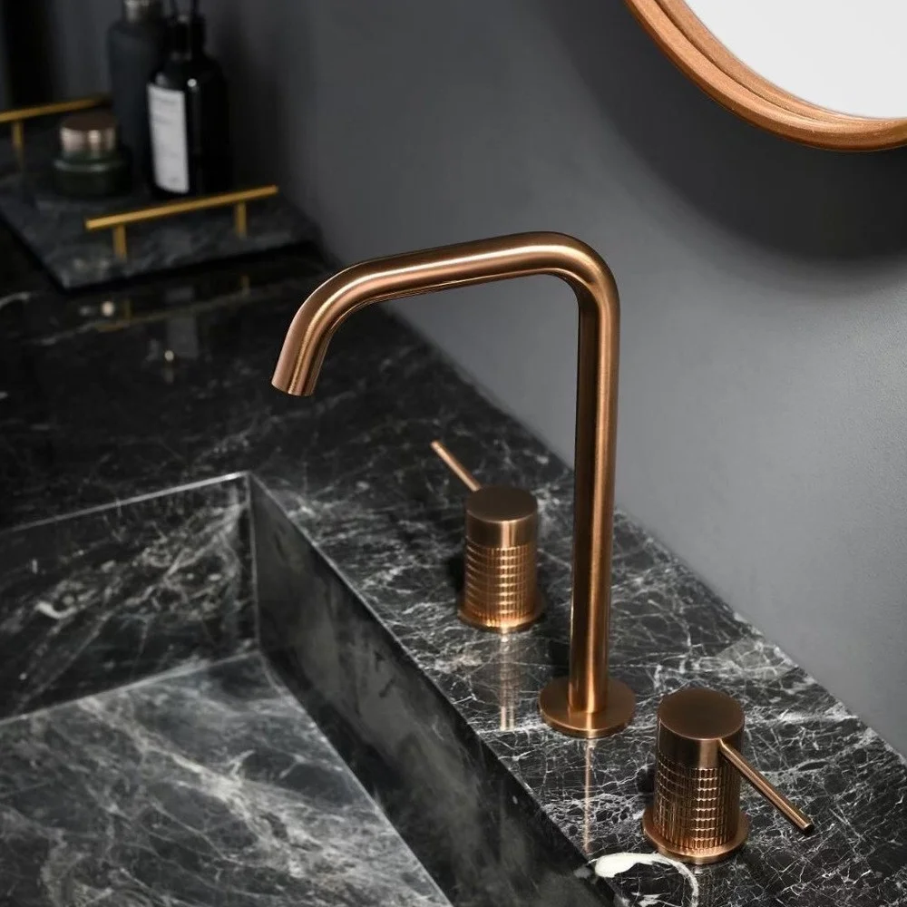 Popular in Europe copper table-mounted basin faucet separated three hole cold and hot anti-slip switch sold best in China