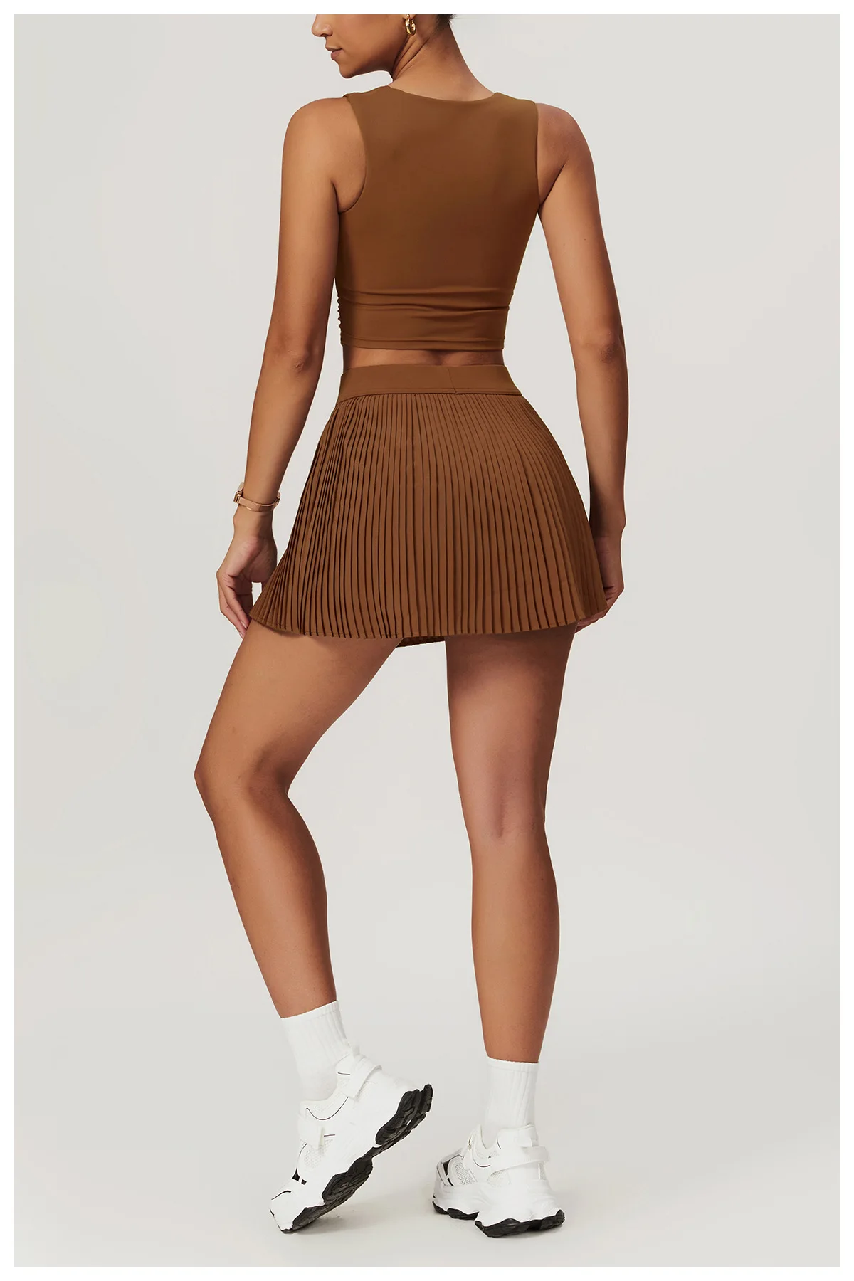 High-waist tennis skirt breathable fabric with built-in shorts lightweight  design for performance in tennis Casso Sports