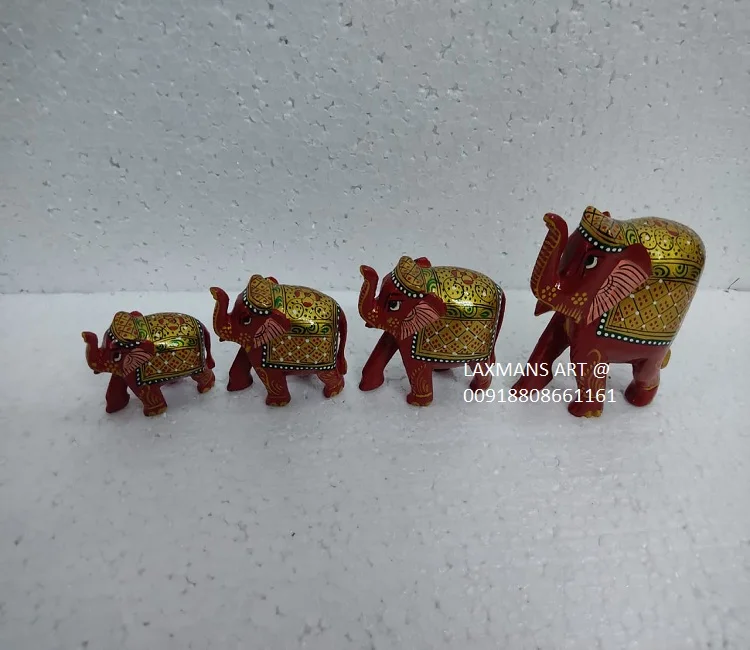 wooden carved elephant statues set 4 pcs elephant set wooden decorative elehphant statue set from india wooden elephant