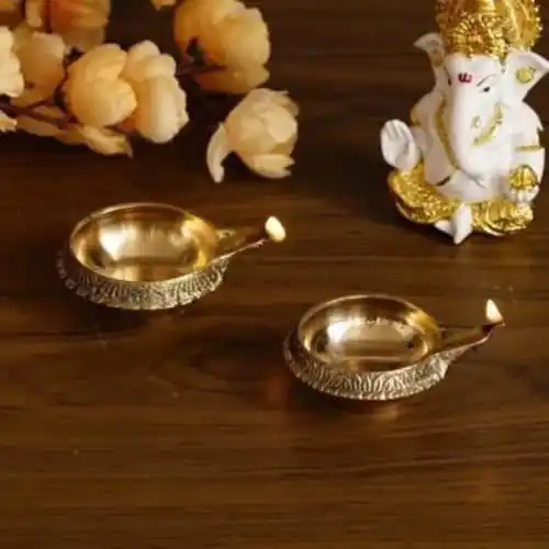 latest and fine quality brass kuber diya pooja diya 100% pure brass diya  best gift item for pooja functions and ceremonies .