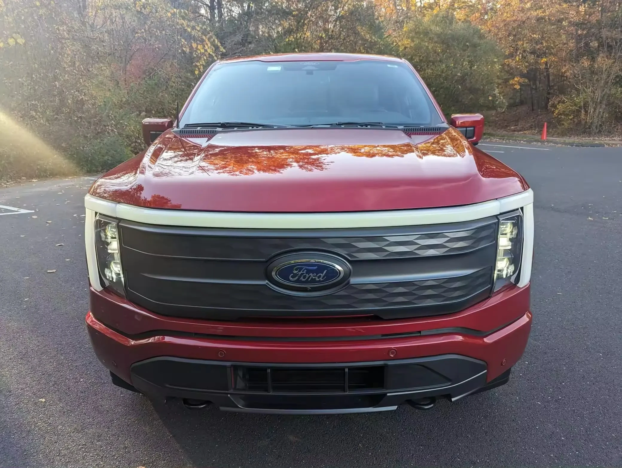 Clean Used 2022 Fordd F-150 Lightning Lariat Extended Range Battery AWD Rapid Red Metallic Mostly Unmodified (Mileage 14.000)