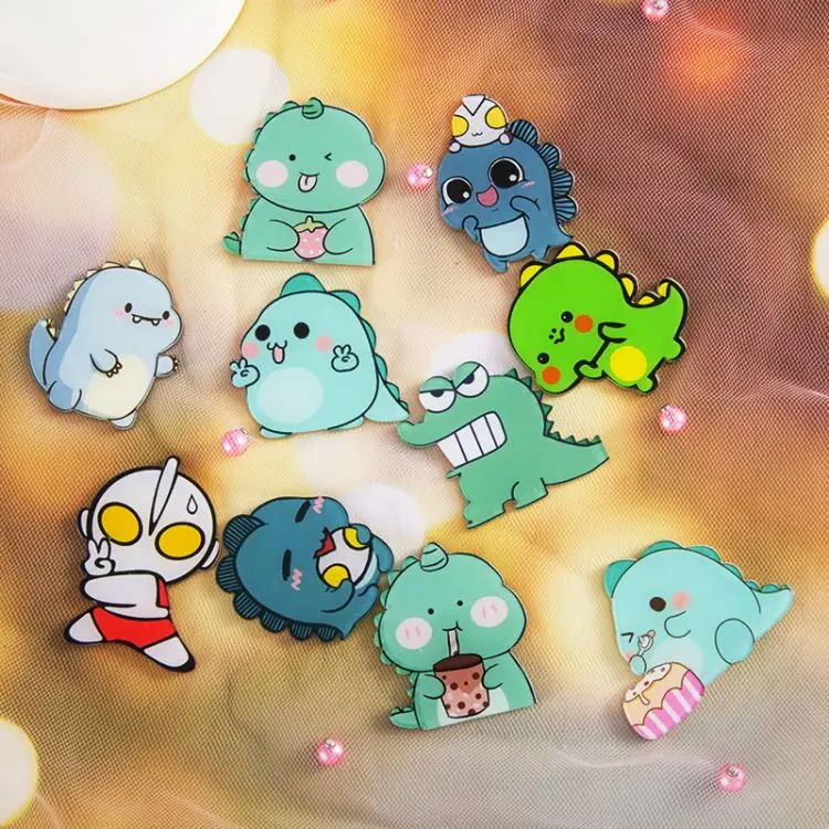 Stock Japanese and Korean soft cute little monster dinosaur brooch acrylic cartoon badge student cute bag pendant jewelry pin