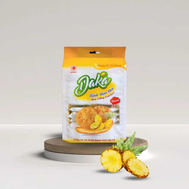Sandwich Pineapple flavor cookie DAKA brand from HaiHaCo Biscuits Soft Jam Filled Round Crispy Biscuits Box Package in Vietnam