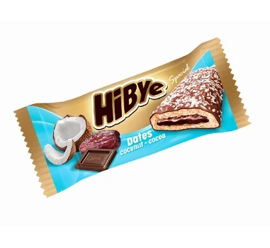 Вкусный центр заполненный печенье с составным покрытием украшенным кокосовым порошком