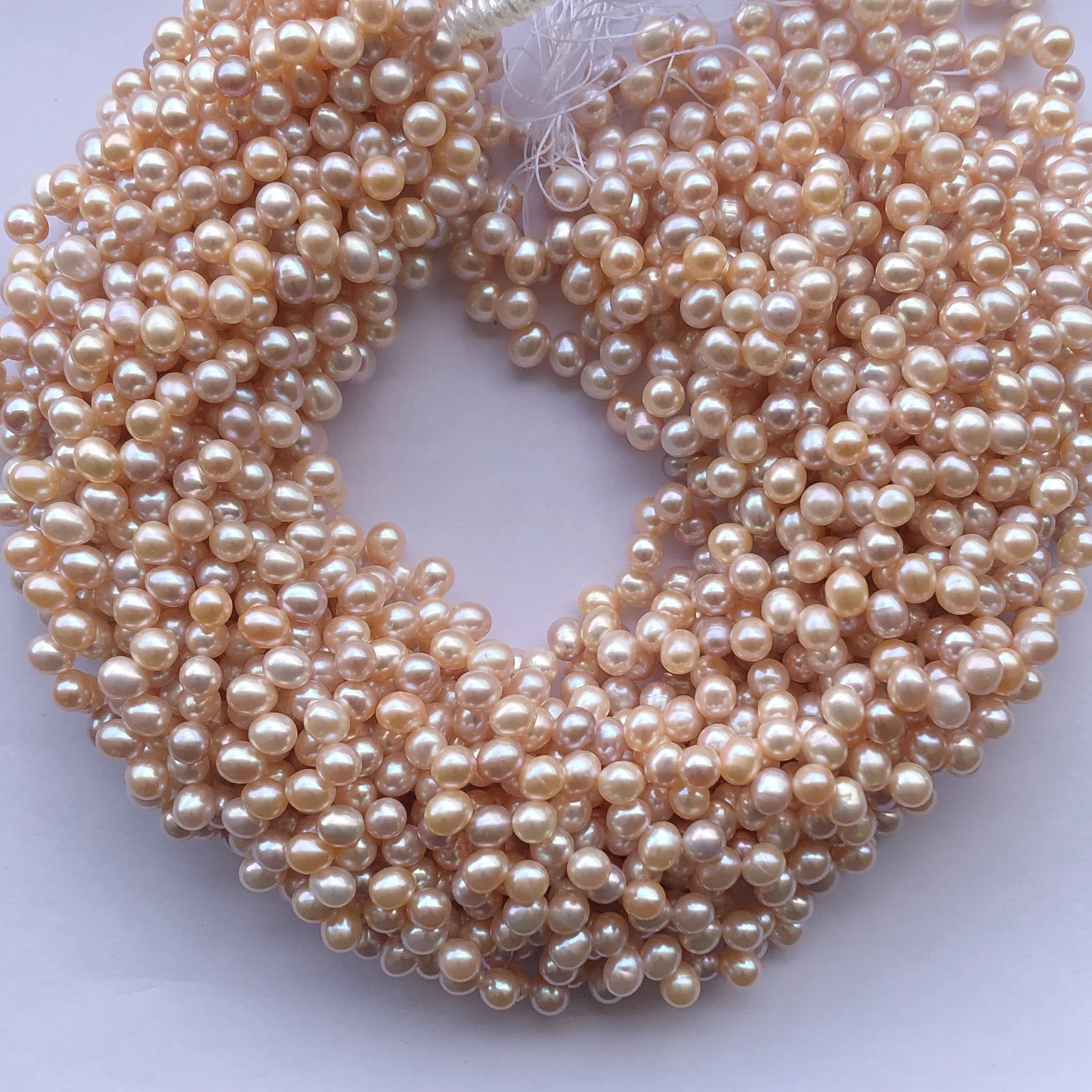 6mm 8mm Natural Pink Rose Gold Color Freshwater Pearl Stone Potato Side Drilled Gemstone Beads at Best Wholesale Factory Price