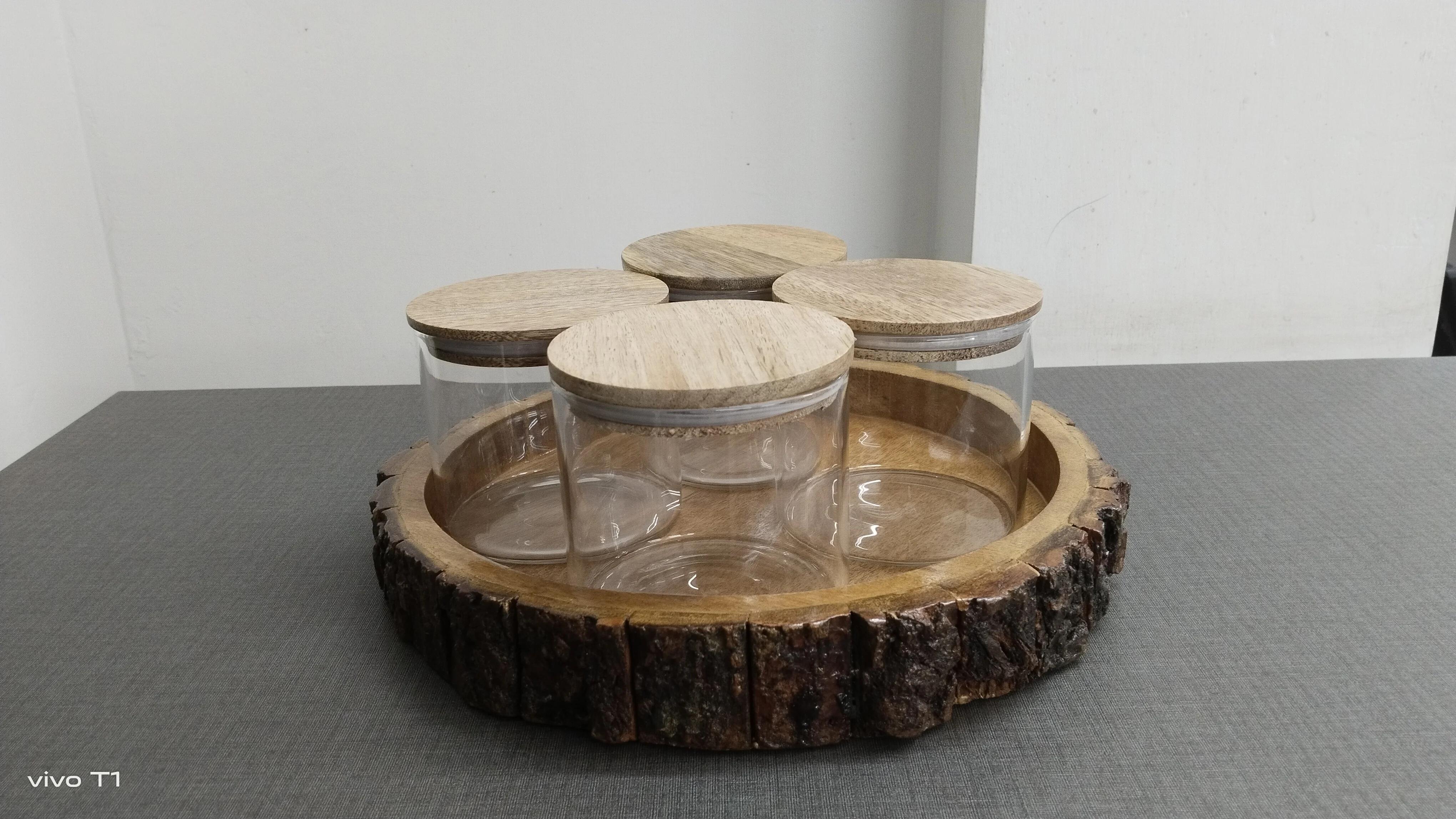 Top Quality Serving Wooden Tray with Borosilicate Glass Jars Set of Four Round Shape Wooden Tray used in Home Kitchen