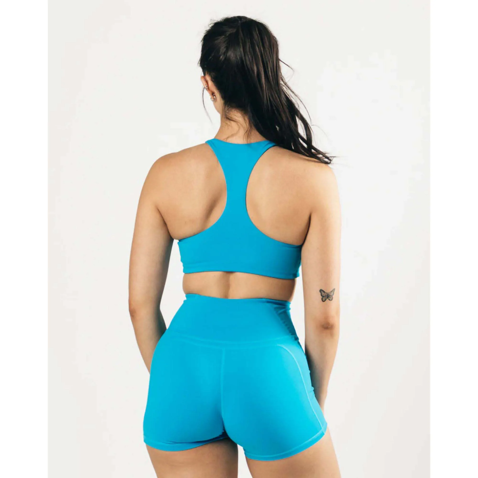 78% Nylon 22% Elastane High Neck Style Fit Racer Back Bindingless Hem Womens Medium-Support One Piece Pacific Blue Sports Bra
