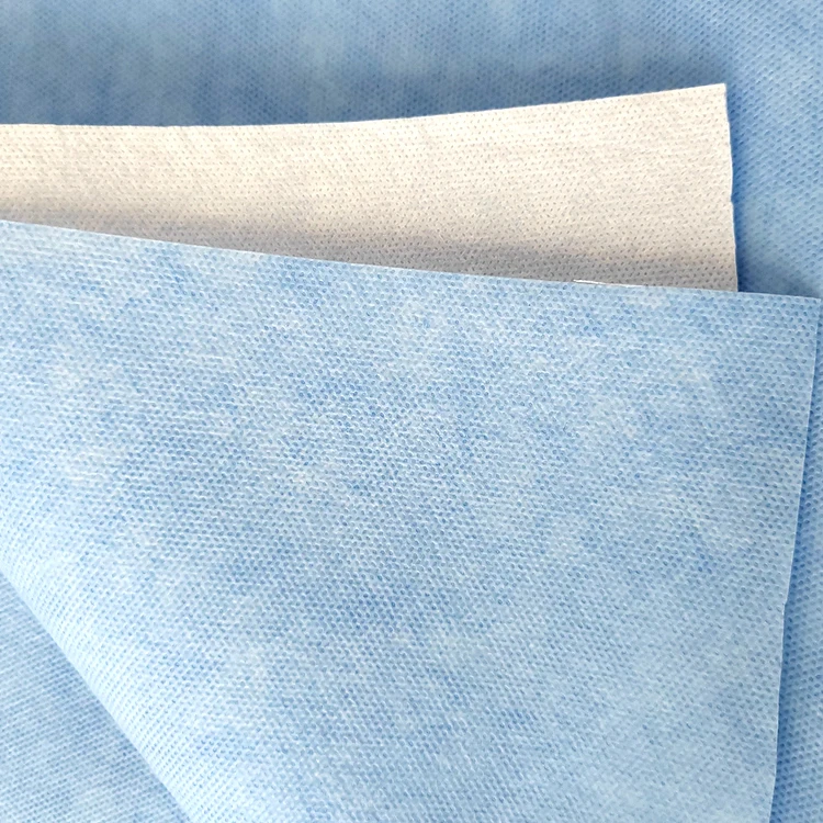 Non woven and breathable film laminated fabric for surgical gown
