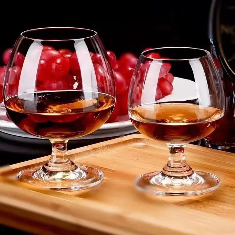 Hot vodka brandy frosted wine glass and brandy whisky glass goblet