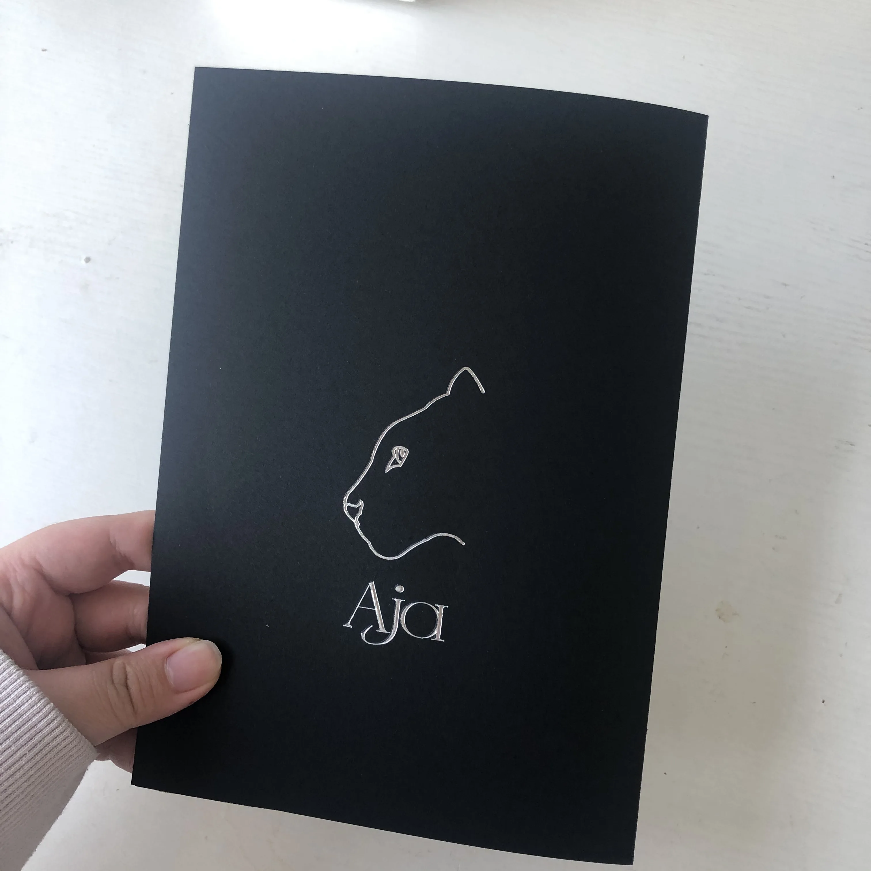 Custom luxury black kraft paper embossed silver foil stamping folded card