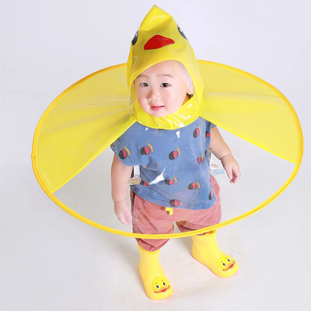 
Kids Cute Ufo Rain Coat Children Creative Umbrella Hat Magical Hands Free Raincoat Cute Duck Rain Gear 
