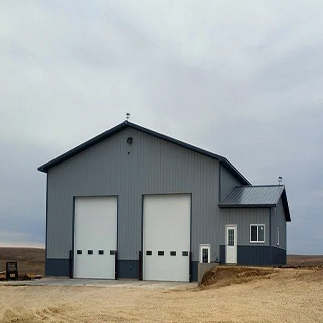 Steel warehouse for a construction site with parapet wall cladding