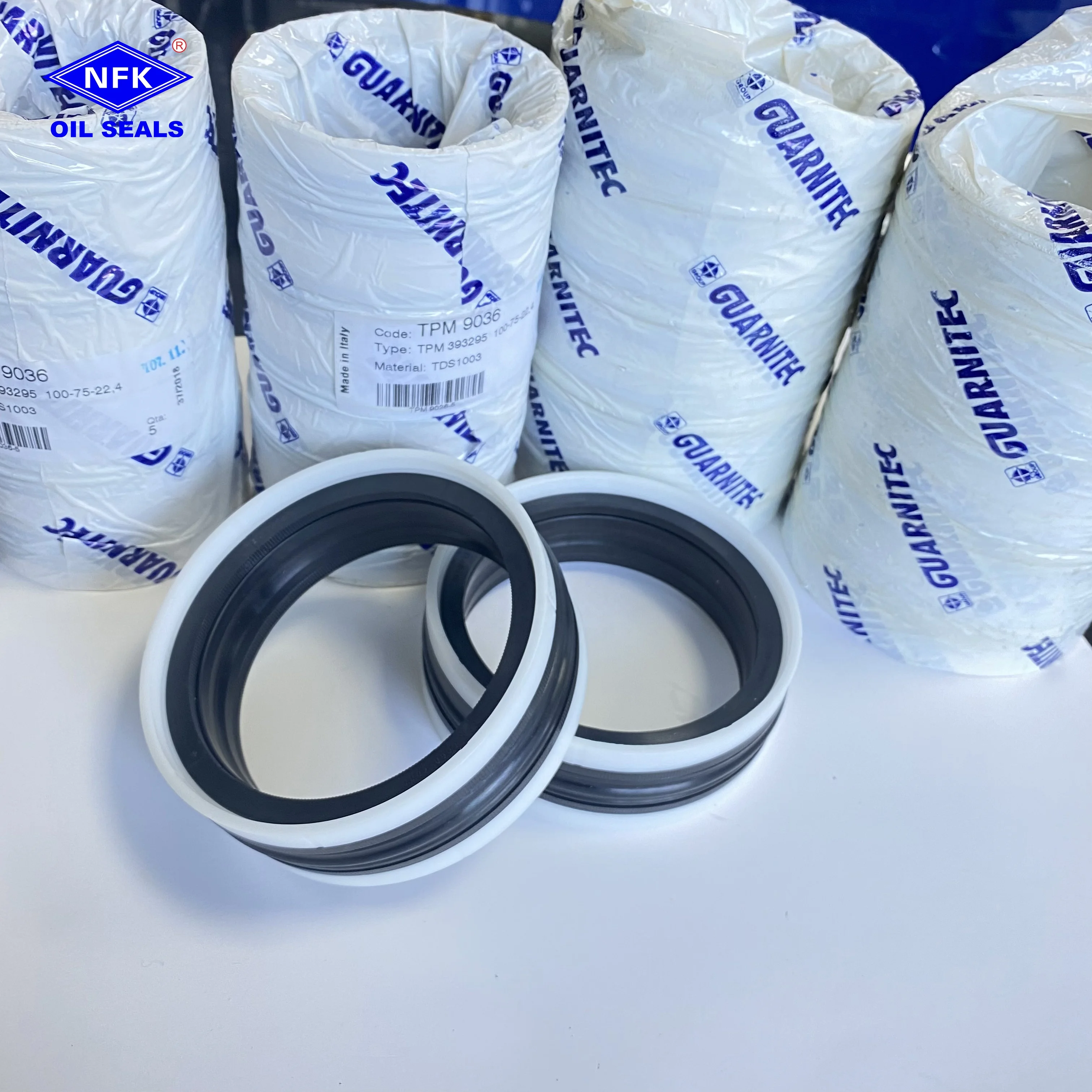 Оригинальное TPM комбинированное поршневое уплотнение Ltaly Nbr Ptfe Материал гидравлические поршневые уплотнения цилиндров национальное масляное крестообразное сравнение