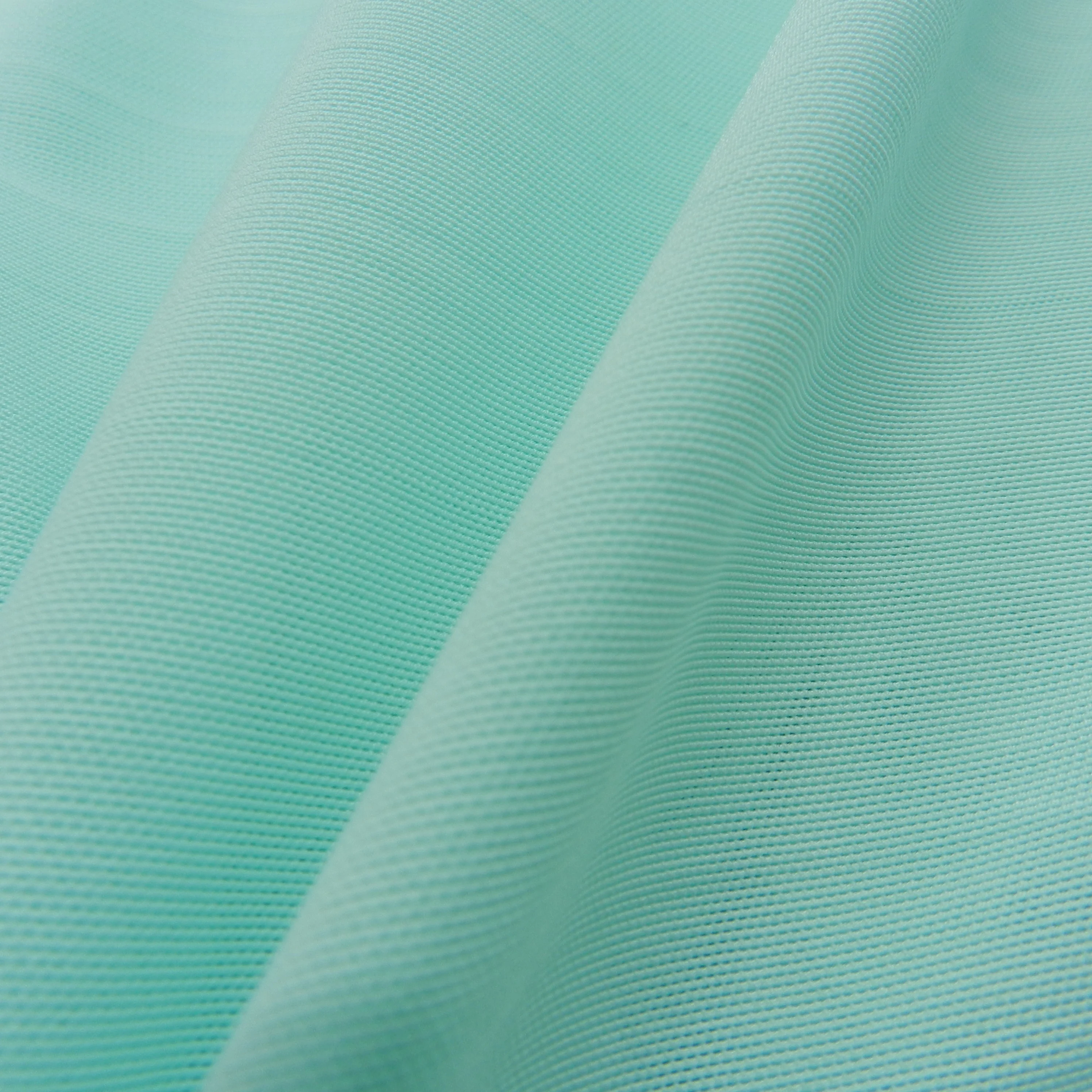 2020 New design high quality  nylon spandex power mesh textured 4 way stretch swimwear and sports wear fabric