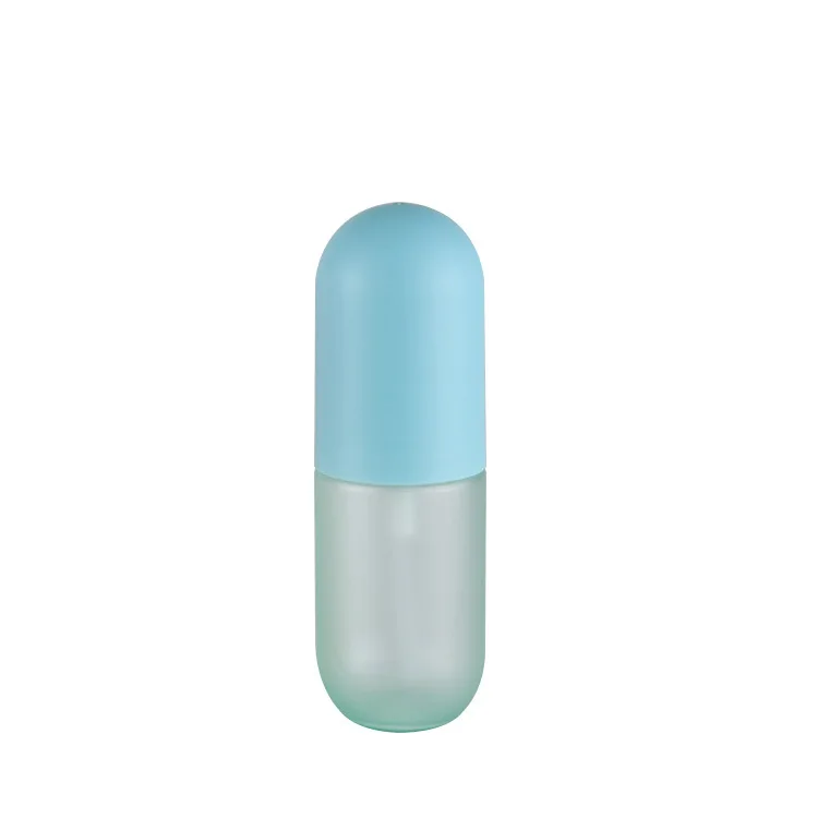 Low MOQ 40ml60ml100ml round empty bottle capsule toner bottle custom blue yellow pink spray bottle