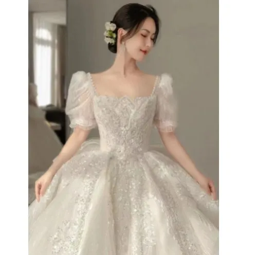 French light wedding dress 2023 new bride main yarn bubble sleeve trailing heavy industry wedding dress wholesale
