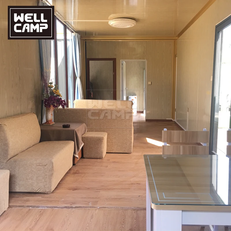 Prefab Container Villa L Type Container Apartment Shipping Container House Galvanized Steel Frame Modern Sandwich Panel Wellcamp