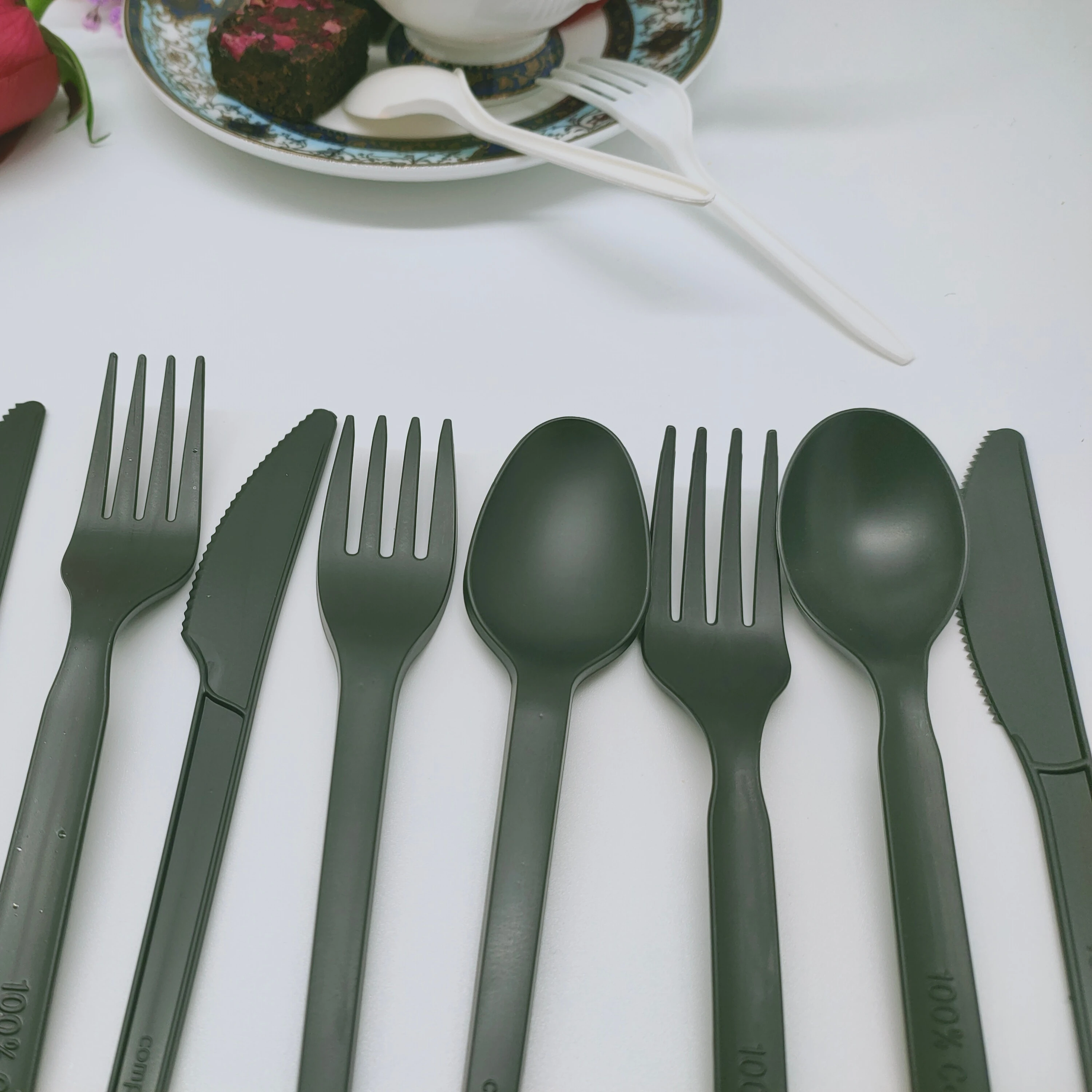 
GreenWorks degradable eco-friendly cutlery with Napkin ,white or black CPLA plastic fork and spoon dinnerware sets 