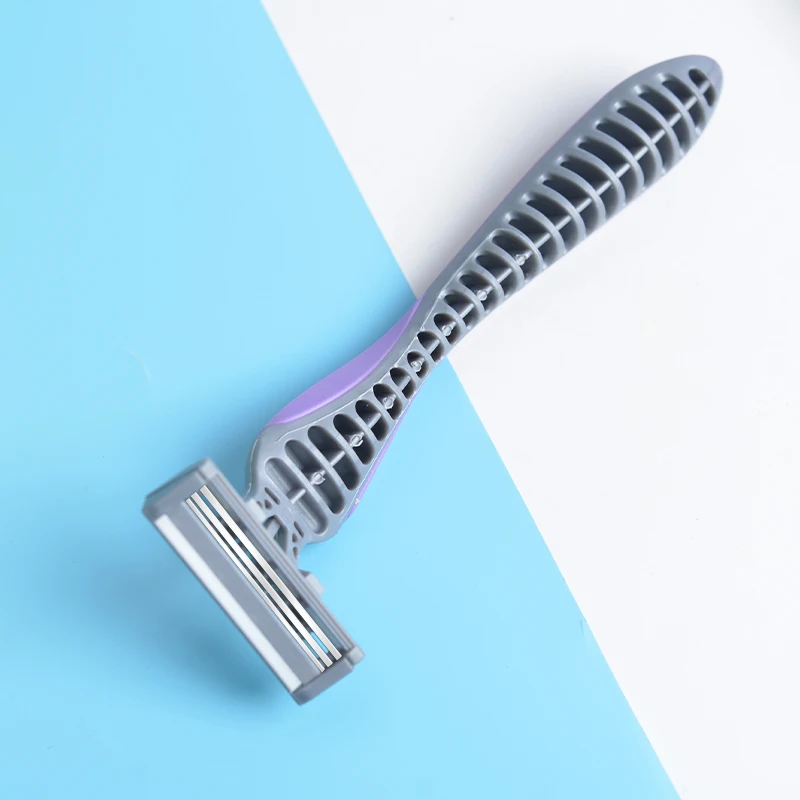Hot Selling purple 3 Blades Recycled Plastic And  Streamline Wave Handle Pivoting Head Type Female Lady Women Shaving Razor