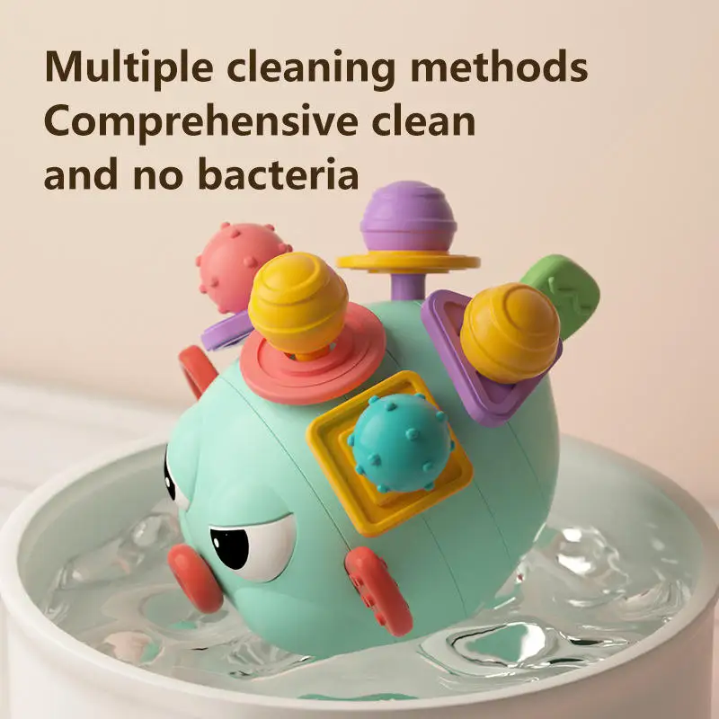 2024 Wholesale Early Childhood Education Sensory Baby Toys Montessori Baby Twist Fish Puffer Fish Play Hand Teether Rattle Ball