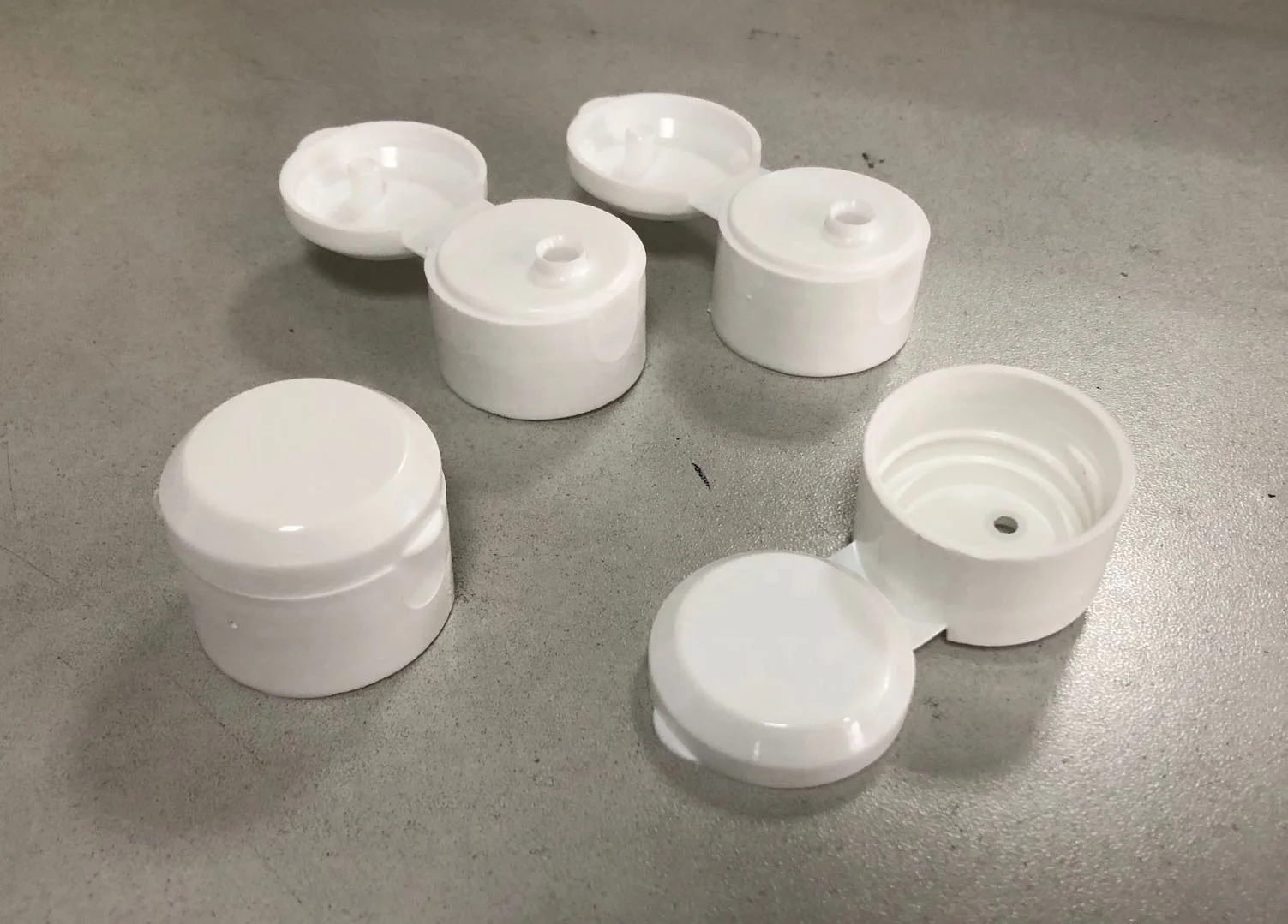 flip top cap tapa closure closing folding machine