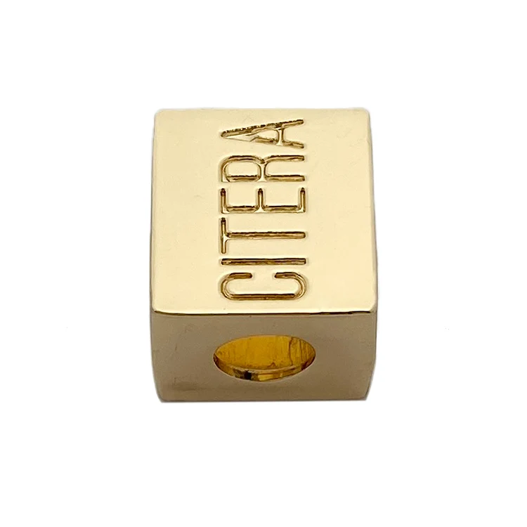 Cube shape making custom logo brand metal cored end stopper for swimwear