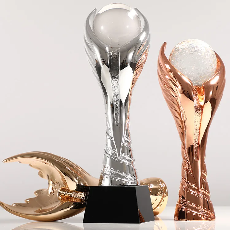 Gold, silver and copper resin trophy customized football and basketball competition group award making flying wings games