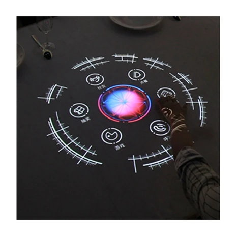 The interactive table can be touched and clear screen to play games and order food