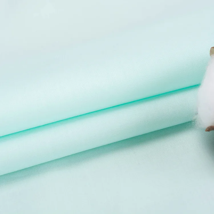 The organic newest 2024 light weight minimalist 40s cotton woven poplin solid fabric rolls for shirt