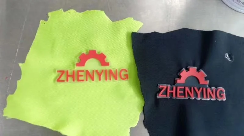 Embossing machine for apparel fabric flocking embossing logo production