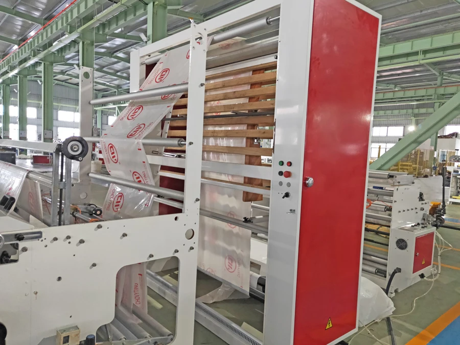 
Fully automatic plastic super sine wave top takout round handle punch bag making machine 