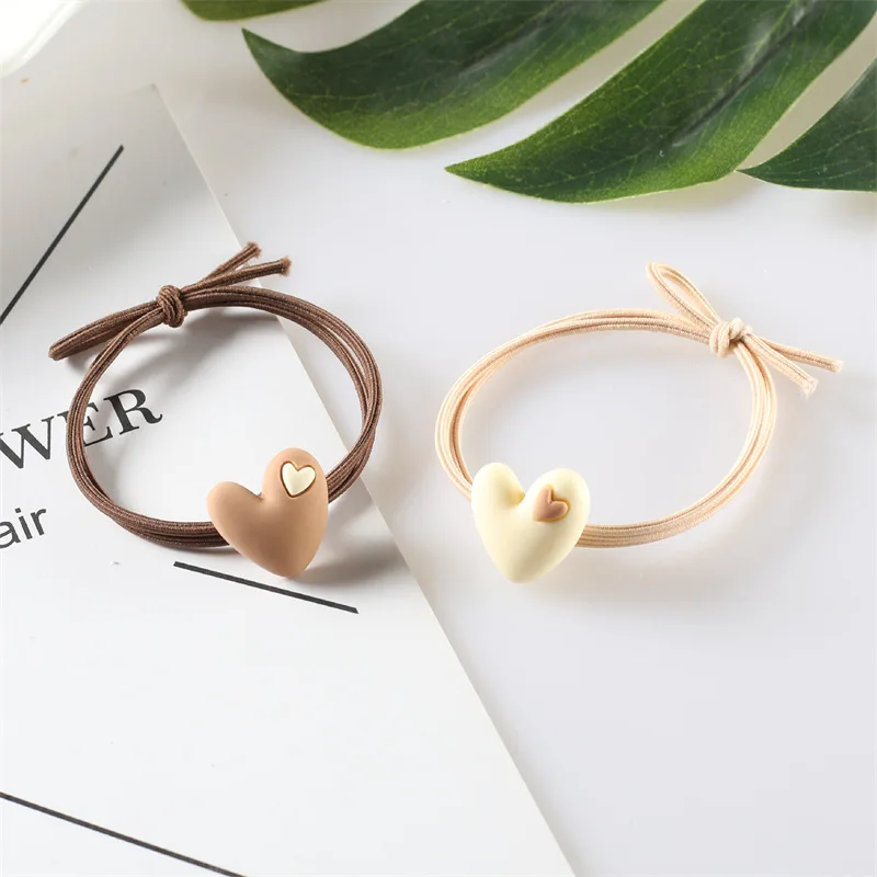 Korean version of popular peach heart milk tea color tie hair adult student hair circle heart-shaped elastic band