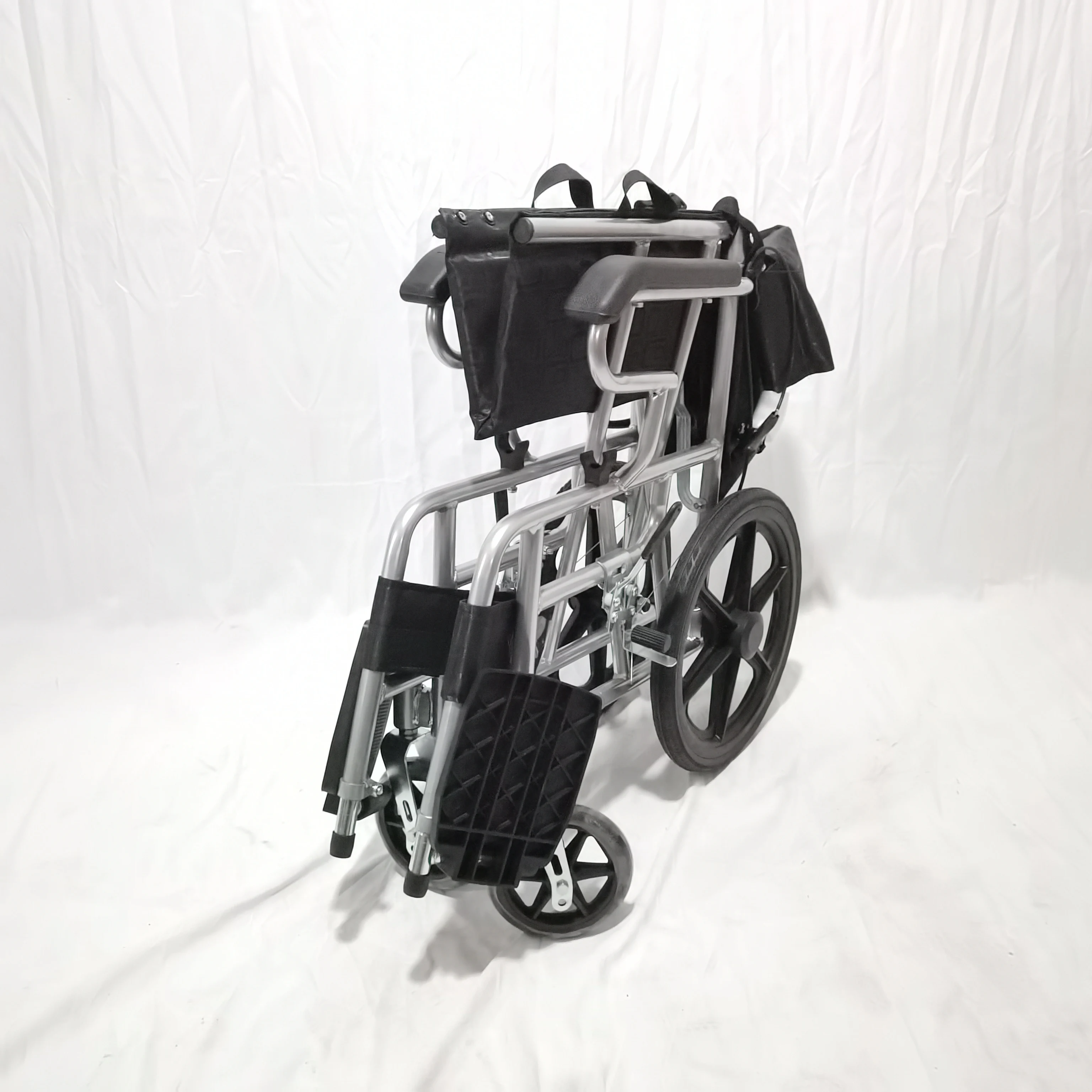 Manufacturers Make Foldable Carbon Steel 16 Inch Rear Wheel Manual Children Wheelchair