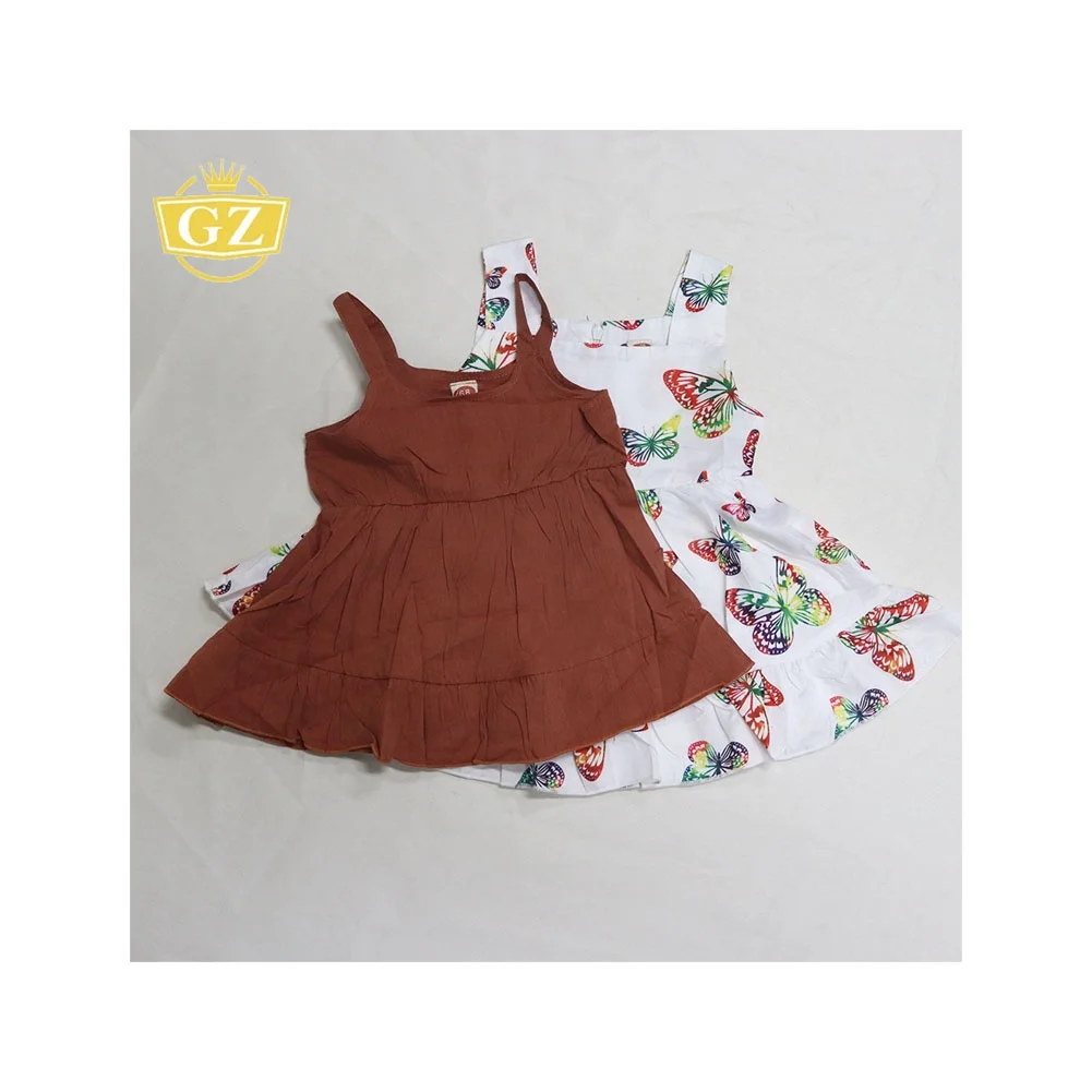 GZ Hot Sales Assorted Mixed Packaging Apparel Stock, Low Price Factory Garments Clearance Kid Dress Clarence Apparel Stock