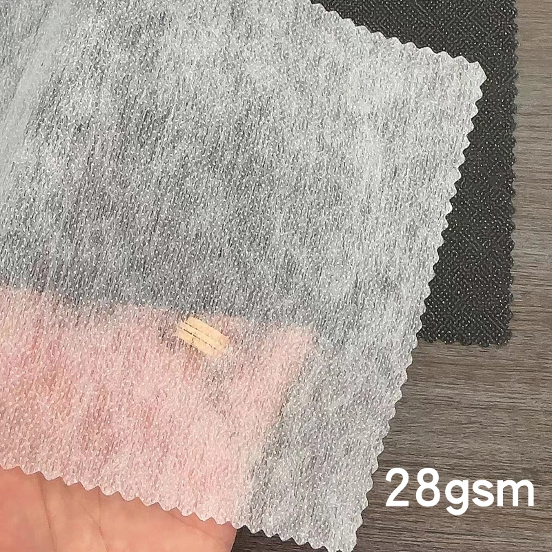 Wholesale 100% Polyester Non-woven fusing interfacing 28gsm Double Dots Non-woven Interlining Fabric-YBND8340