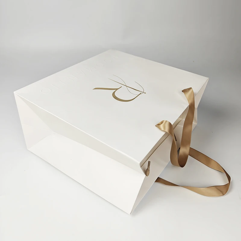 White shopping packaging clothes bag custom logo coated paper with ribbon handle luxury gift paper bags