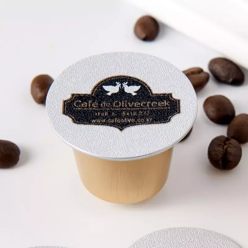 Hanlin Top Quality Empty plastic Coffee Capsule Made by Food Grade Aluminum Foil Laminated Paper