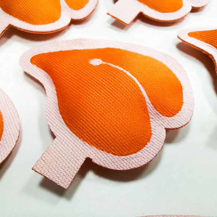 China factory makes packed cotton braided labels, high density 3D woven labels cartoon stickers, suitable for clothing toys