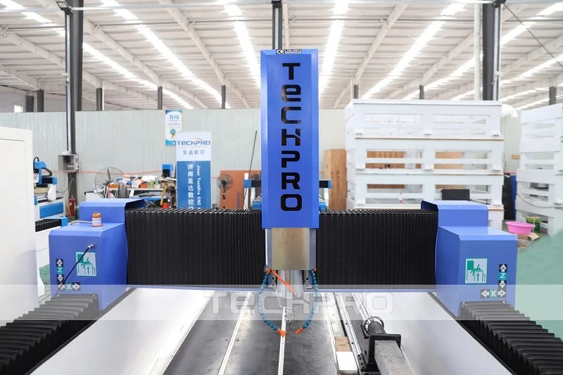 TECHPRO CNC 5.5kw Water Cooled Spindle Rotary Axis 3d CNC Stone Router Machine With Automatic Tools Changer