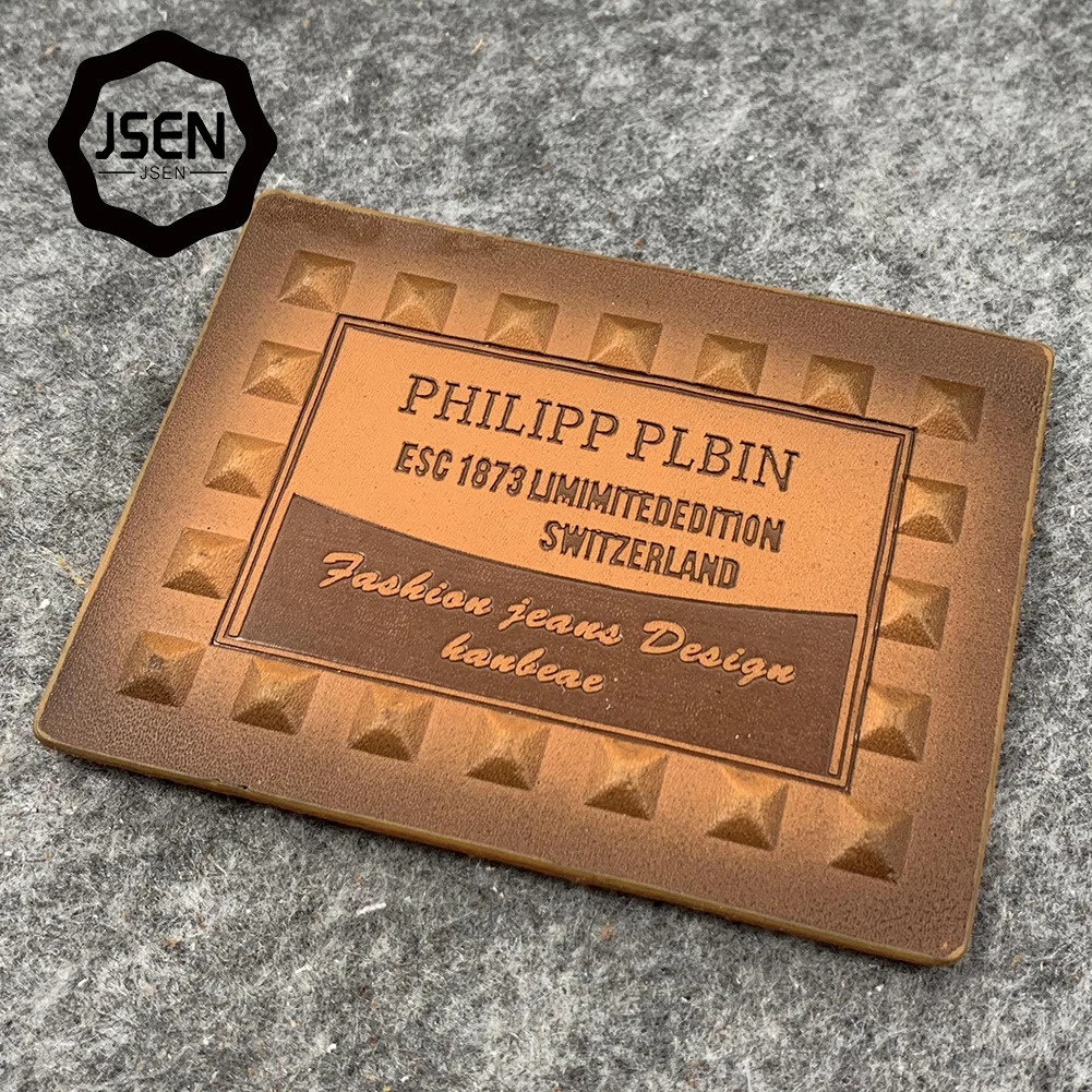 
Best price Custom brand jeans tag pu label embossed leather label patch for clothes garment 