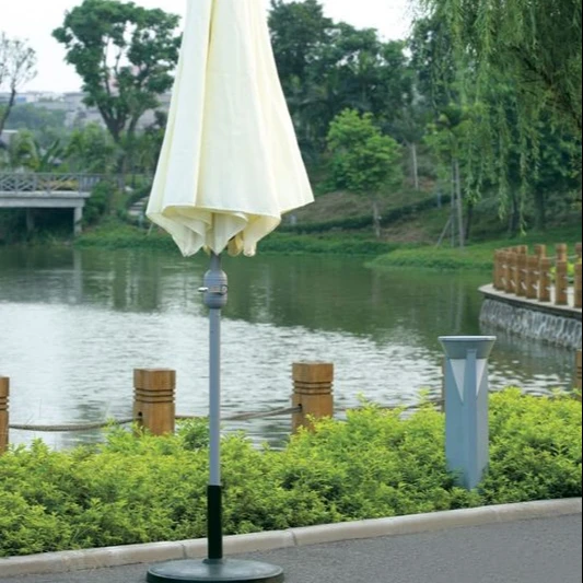 plastic outdoor table chair with large golf umbrella tent beach