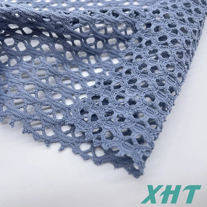 Hot selling color dyeable  hollowed-out eyelets fabric for  swimwear